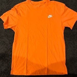 Small orange Nike t shirt